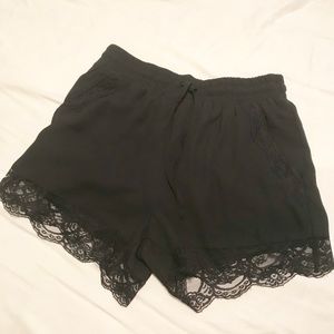 Rehab lace shorts by Lilly Ghalichi.
